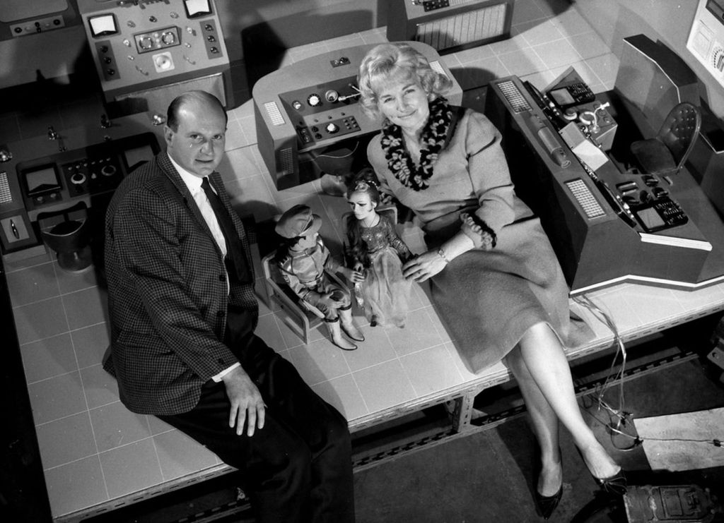 Gerry and Sylvia Anderson posing with Stingray stars Troy Tempest and Marina on a set from the Thunderbirds episodes, Sun Probe and The Perils of Penelope.
