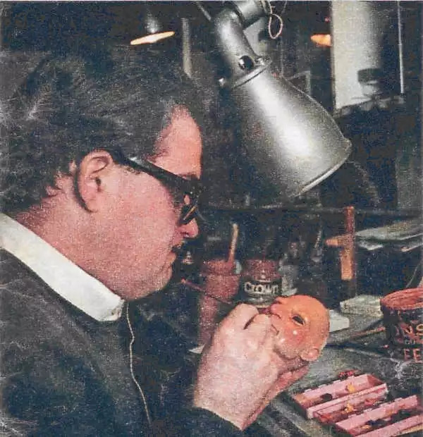 John Blundall painting a guest puppet character.