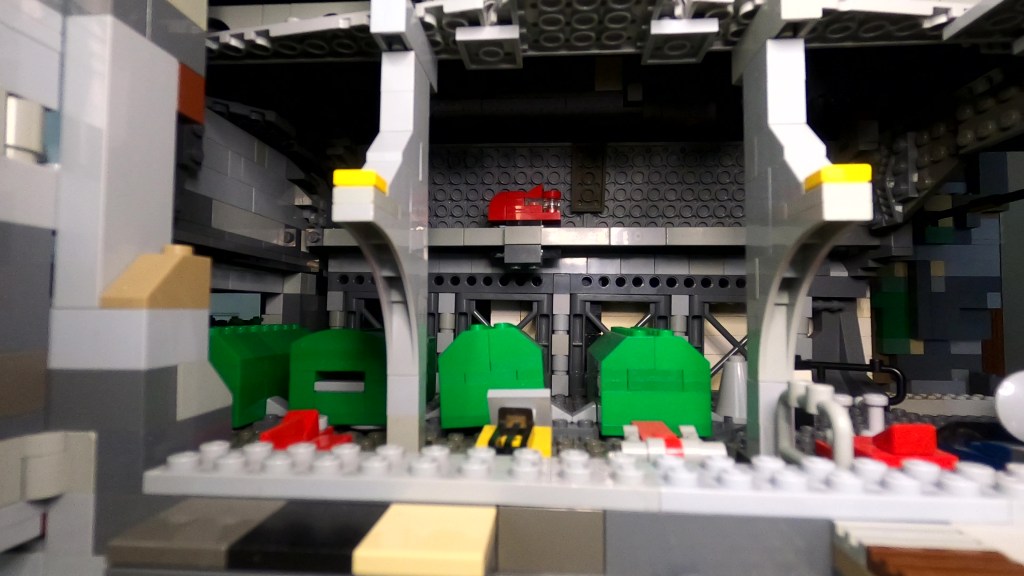 Monorail car running through the pod vehicle storage bay.